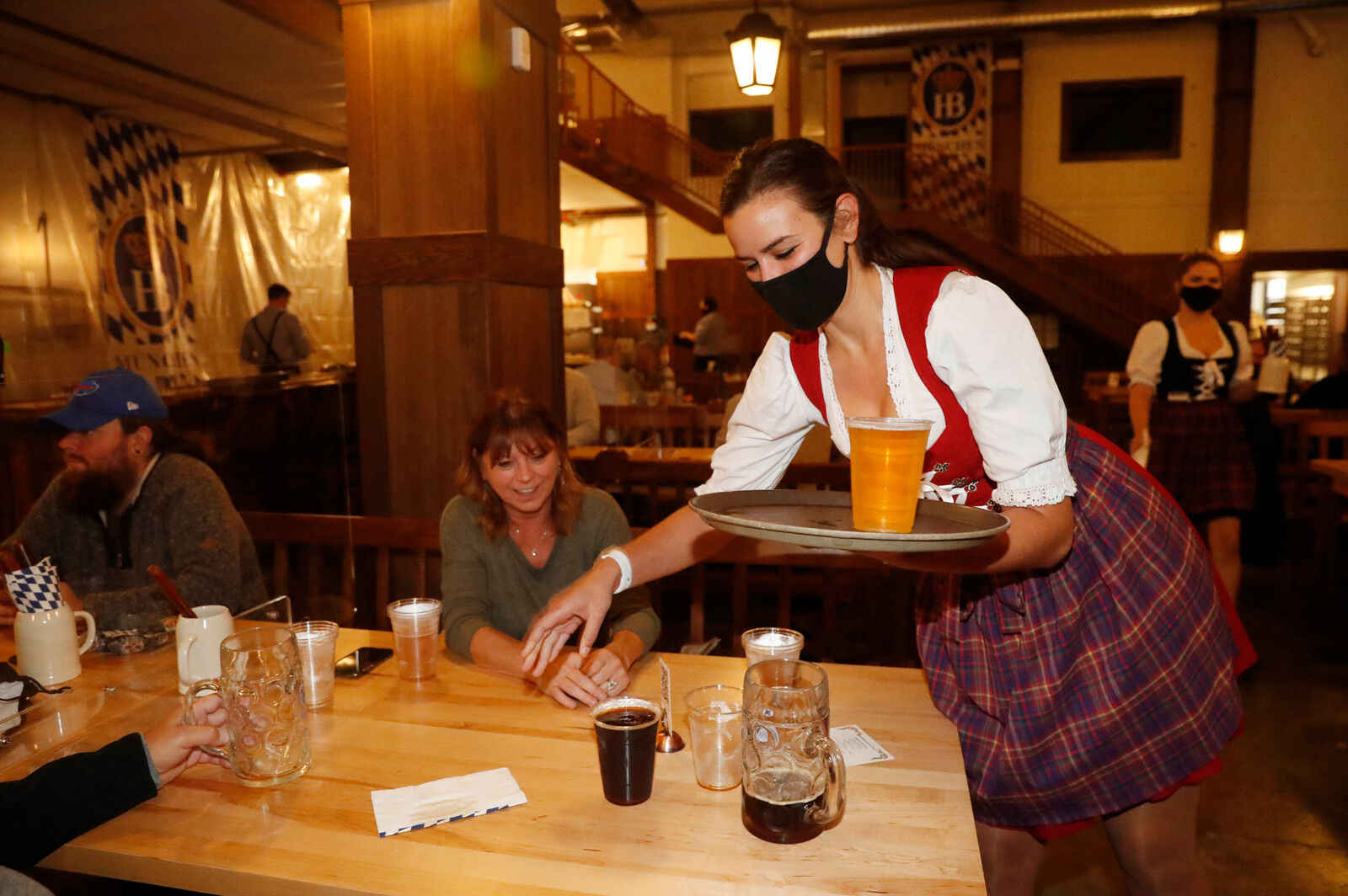 Serving in a dirndl dress